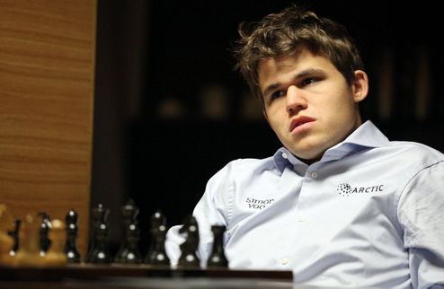 Шахматы. Карлсен: хотелось бы встретиться с Анандом в приятном месте Лидер рейтинга ФИДЕ - о том, изменится ли его подготовка к матчу с обладателем шахм...