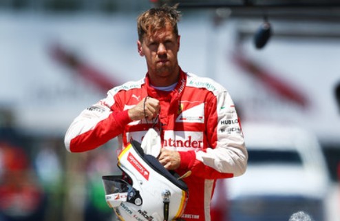 Формула-1. Феттель наказан за обгон под красными флагами Пилот Феррари потеряет пять мест на стартовой решетке Гран-при Канады.
